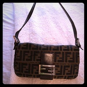Fendi baguette clutch bag.